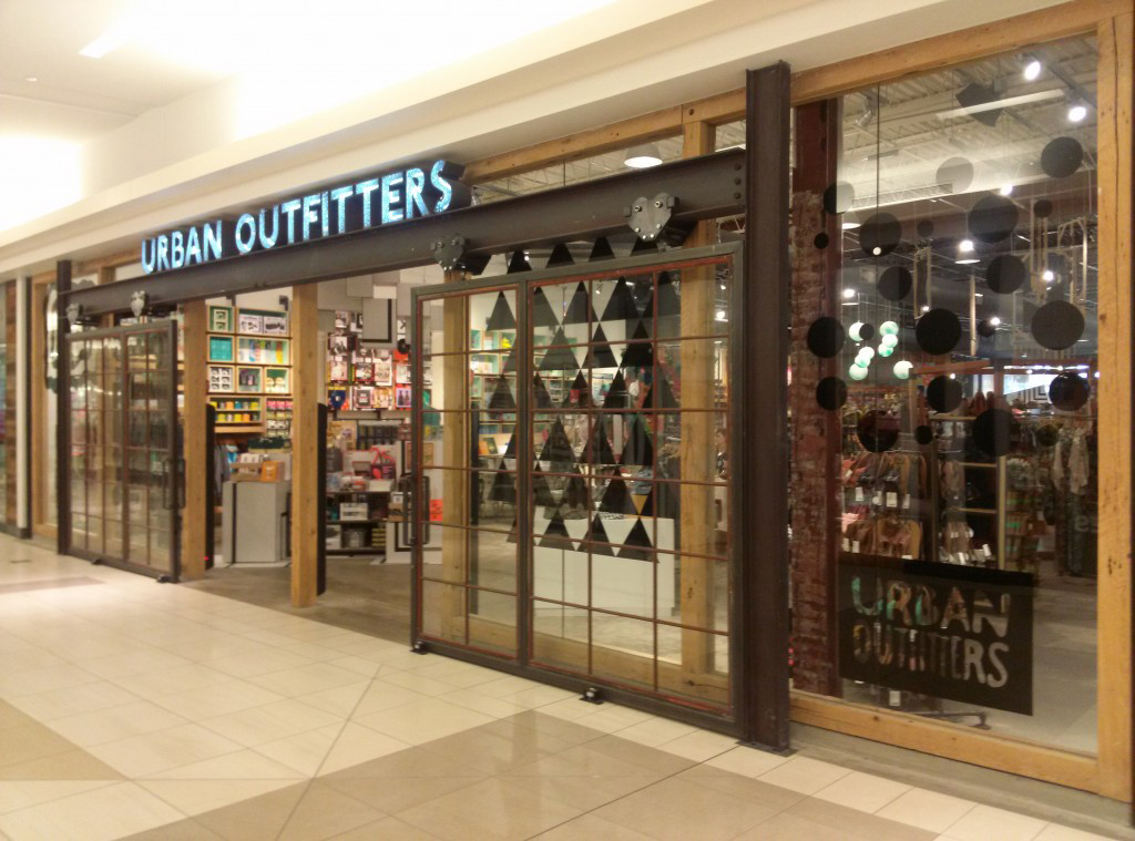 Urban Outfitters vintage barn door sliding window design and installation